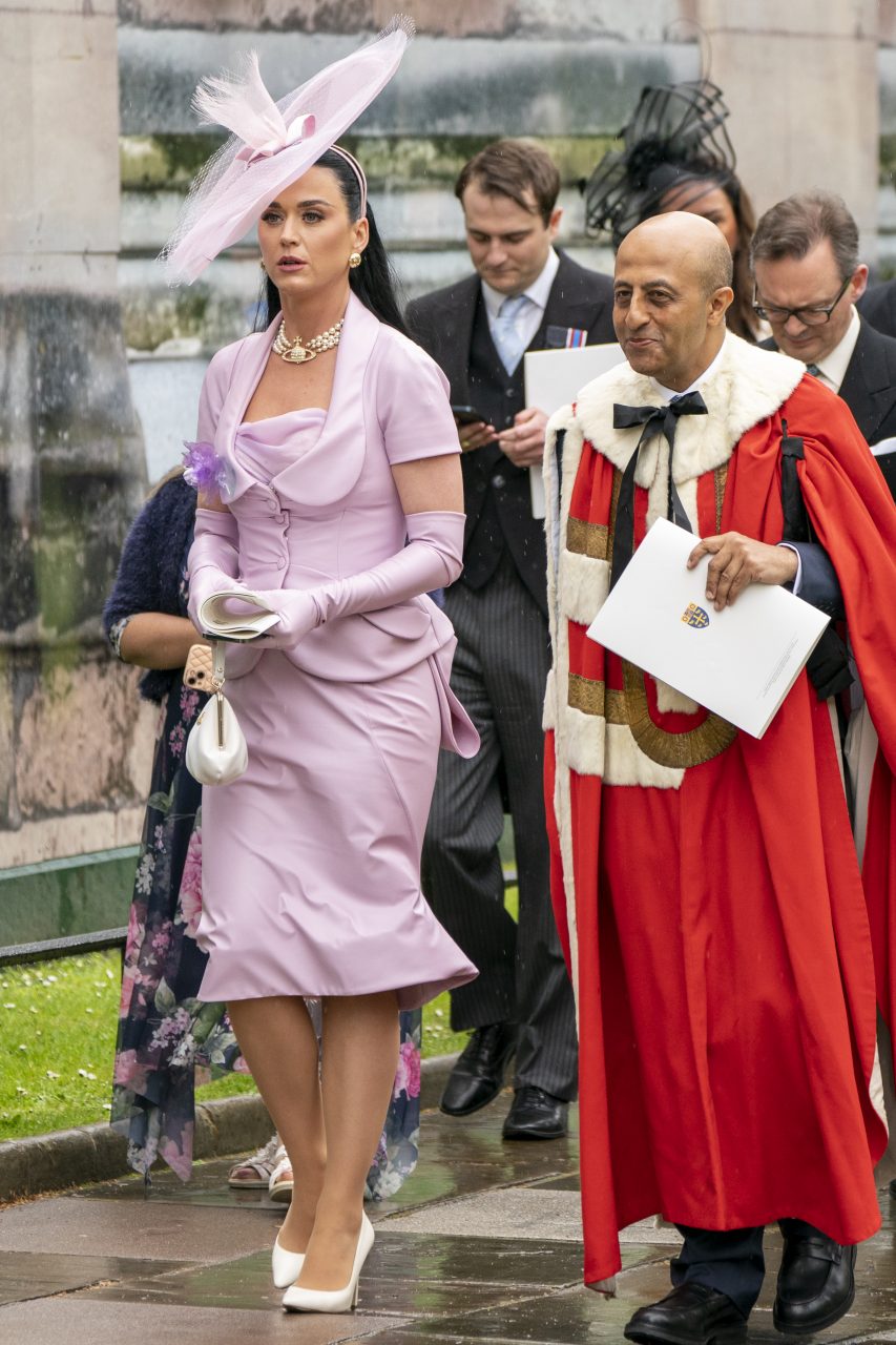 LONDON, ENGLAND - MAY 06: Katy Perry leaves Westminster Abbey following the coronation ceremony of King Charles III and Queen Camilla on May 6, 2023 in London, England. The Coronation of Charles III and his wife, Camilla, as King and Queen of the United Kingdom of Great Britain and Northern Ireland, and the other Commonwealth realms takes place at Westminster Abbey today. Charles acceded to the throne on 8 September 2022, upon the death of his mother, Elizabeth II. (Photo by Jane Barlow - WPA Pool/Getty Images)