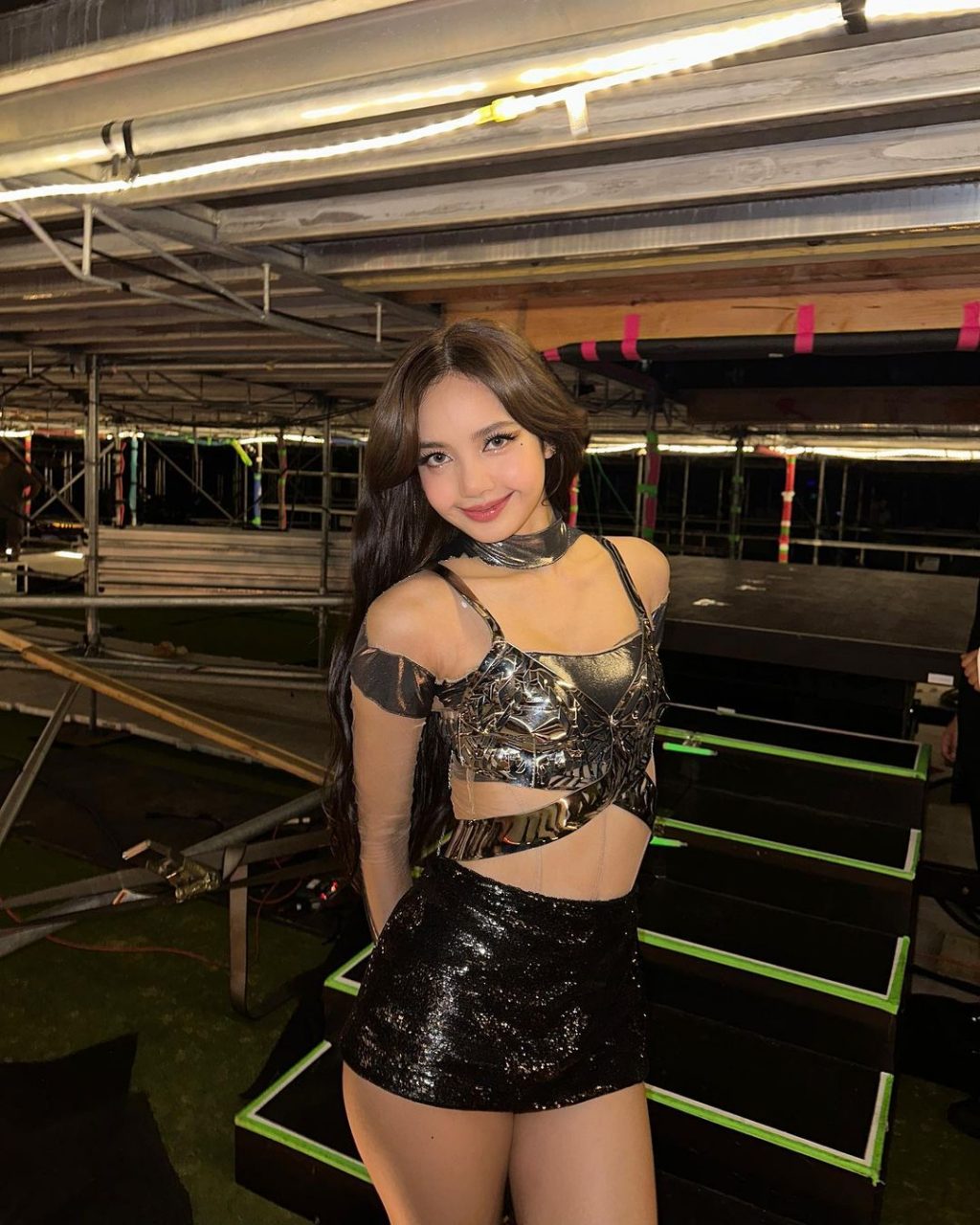 <strong>September 1, 2023</strong> Lisa wearing criss cross top and mini skirt in Los Angeles